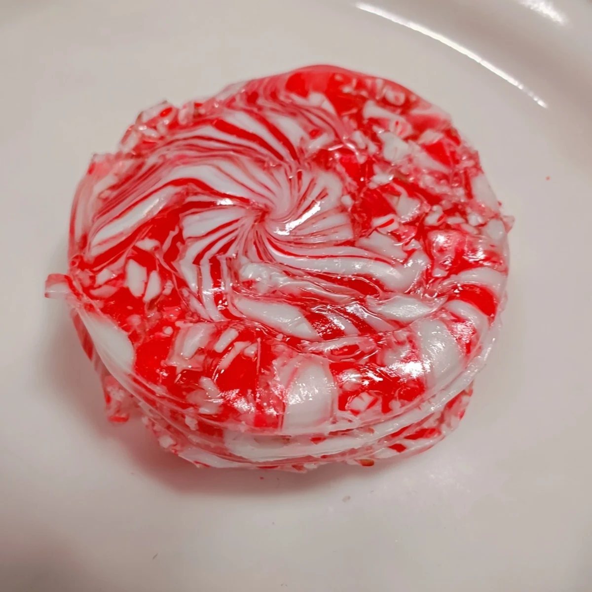 No-Bake Peppermint Candy Bowl, a stunning, festive, edible bowl filled with colorful holiday treats.