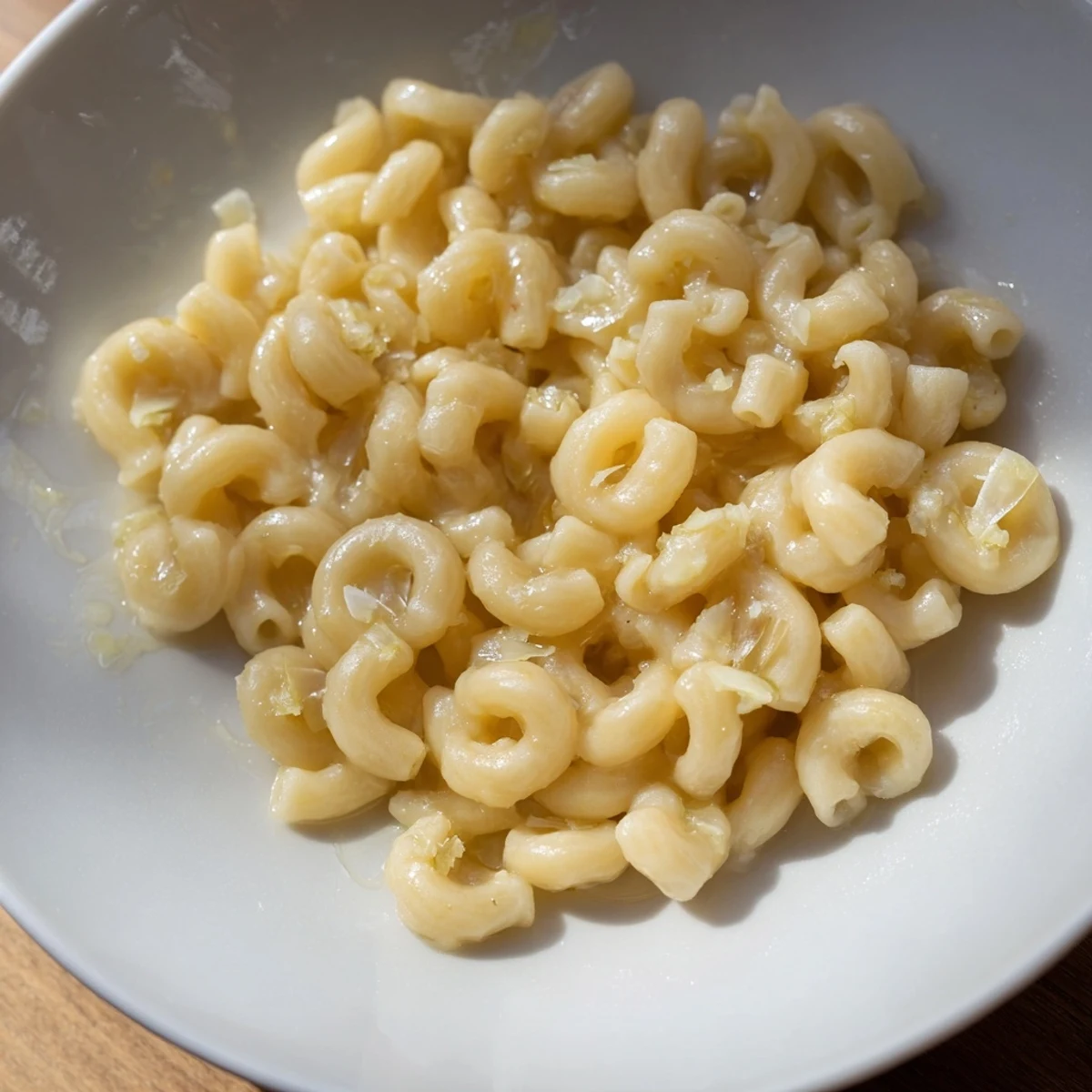 Savory ditalini pasta, coated in the rich, garlicky butter sauce, ready to be served hot.