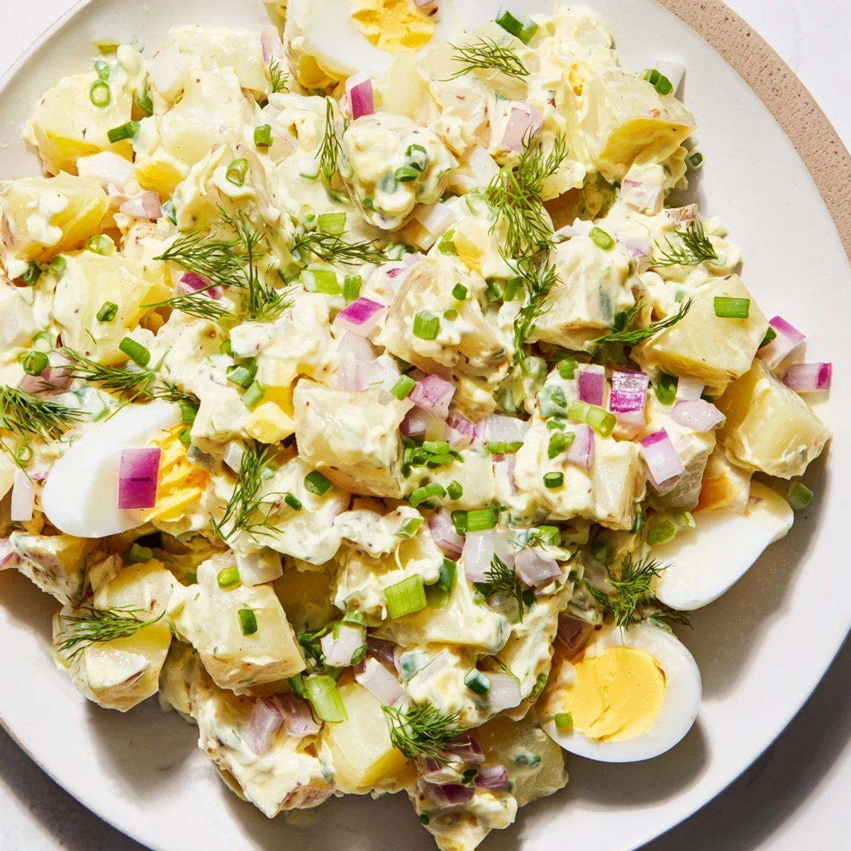 This homemade chopped egg and potato salad offers a refreshing, flavorful taste for any occasion.