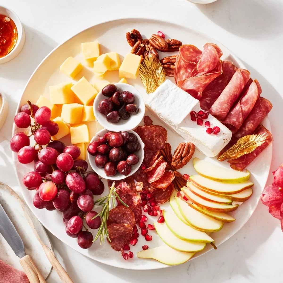 Festive Twelve Days of Christmas Snack Board overflowing with colorful cheese, fruits, and crackers perfect for holidays.