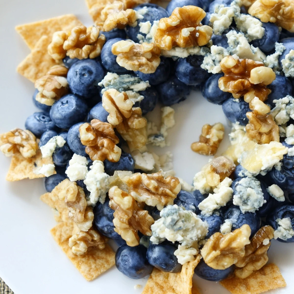 The Olympic Rings appetizer, a stunning vegetarian platter, uses fresh fruits and vegetables in layered rings.