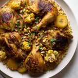 Steaming basmati rice and tender chicken layers create a comforting Palestinian Maklouba, flipped dramatically.