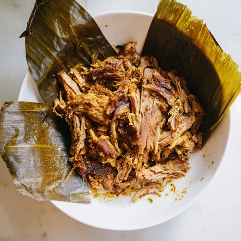 Tender Omani Shuwa meat, fall-apart cooked and rich with aromatic spices, ready to serve, a Middle Eastern delight.