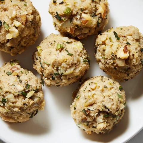 Savory Quick Christmas Stuffing Balls with herbs and golden crust, ideal for a holiday gathering.