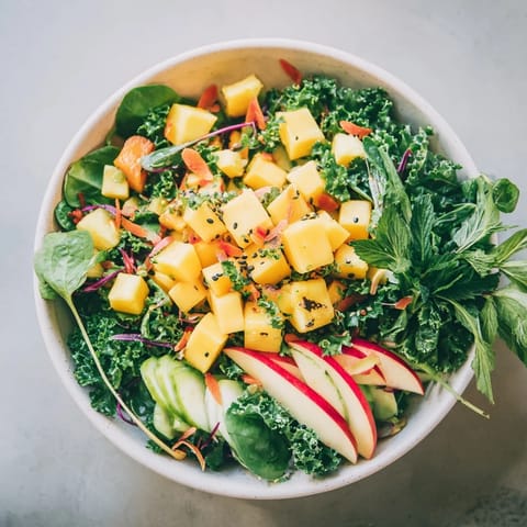 Bright yellow fruits sparkle at the center of this The Sunlit Glade, surrounded by lush greens.