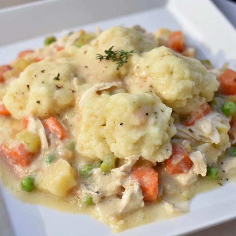 Delicious, homemade Chicken and Dumplings Casserole with tender chicken and vegetables, perfect for dinner.