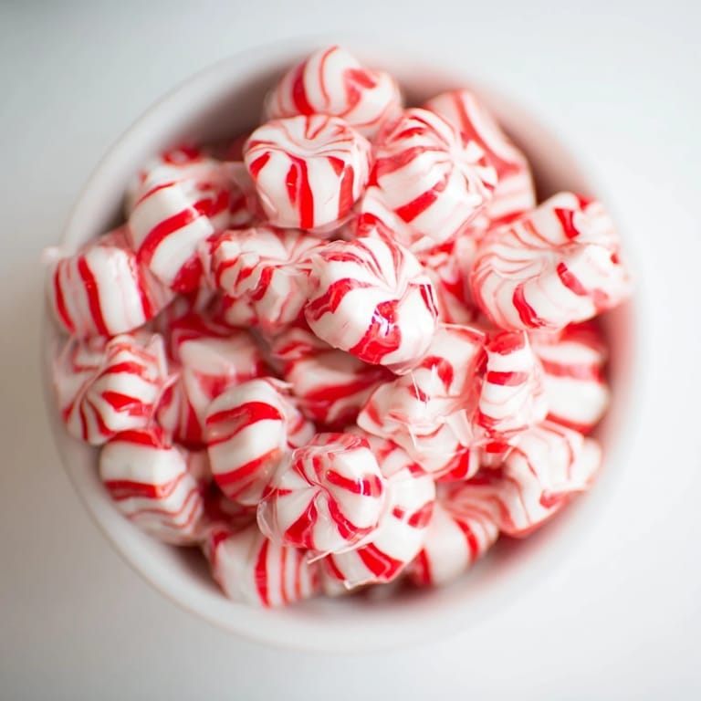 A beautifully molded No-Bake Peppermint Candy Bowl, ready to hold festive candies and make a great gift.