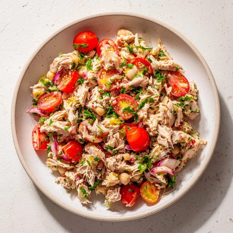 Flavorful Dense Chickpea and Tuna Salad served ready-to-eat with visible ingredients, perfect for a light meal.
