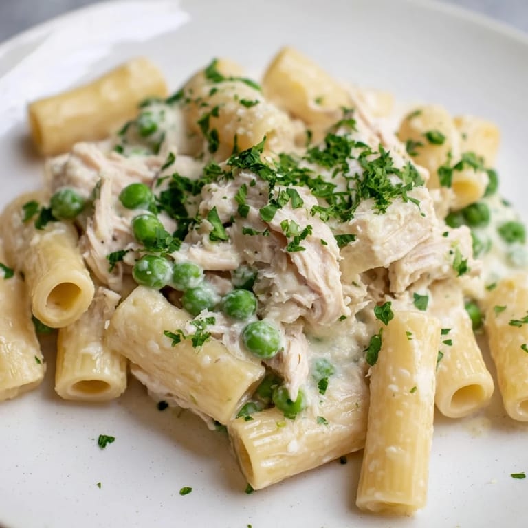 Imagine the amazing aroma of this Slow Cooker Chicken Alfredo Pasta Bake bubbling away, ready to serve!